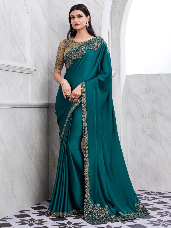 Women's Satin Silk Teal blue Embellished Designer Saree With Blouse Piece Ruffled Neck Blouse Women's Satin Silk Teal blue Embellished Designer Saree With Blouse Piece Ruffled Neck Blouse